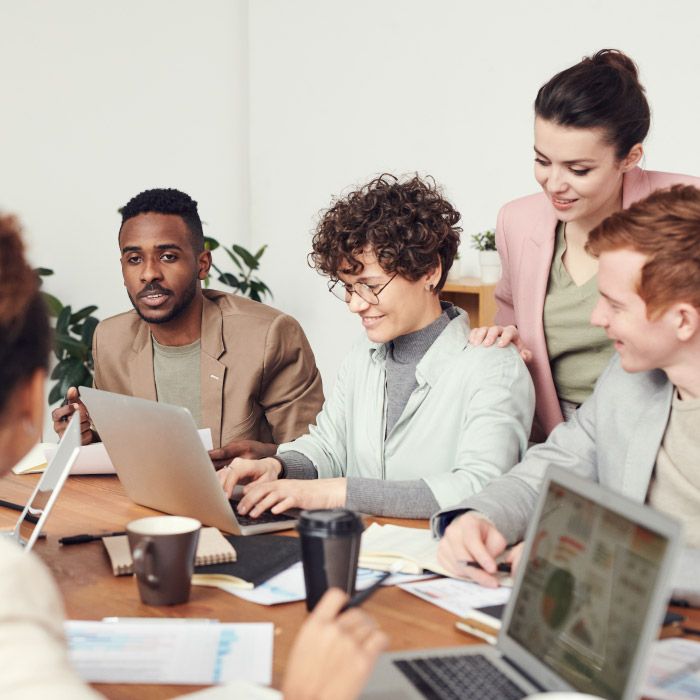 group of co-workers at conference room table